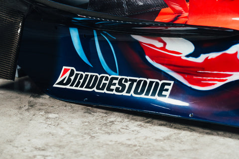 Carbon fiber engine cover from Sebastian Vettel’s 2008 Toro Rosso STR3. / Cofano motore in fibra di carbonio della Toro Rosso STR3 di Sebastian Vettel, stagione 2008.